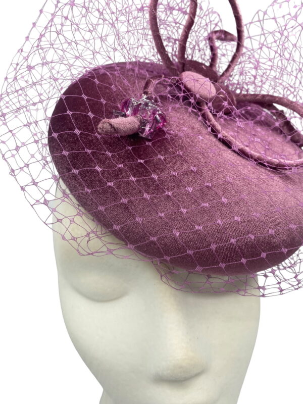 Stunning dusky pink velvet headpiece with structured swirl and hand beaded detail.